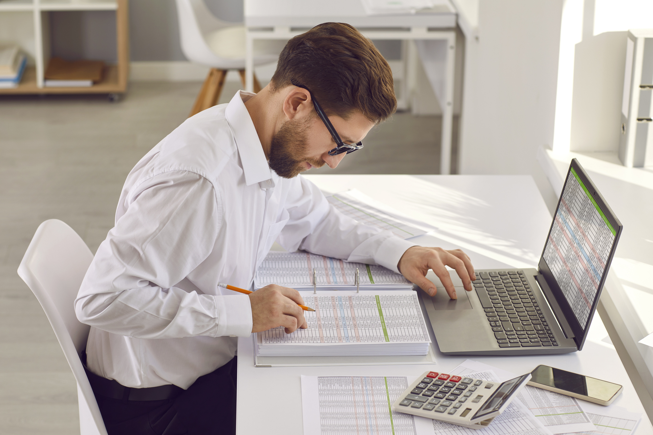 Archer Lewis accountant completing bookkeeping cleanup for a small business