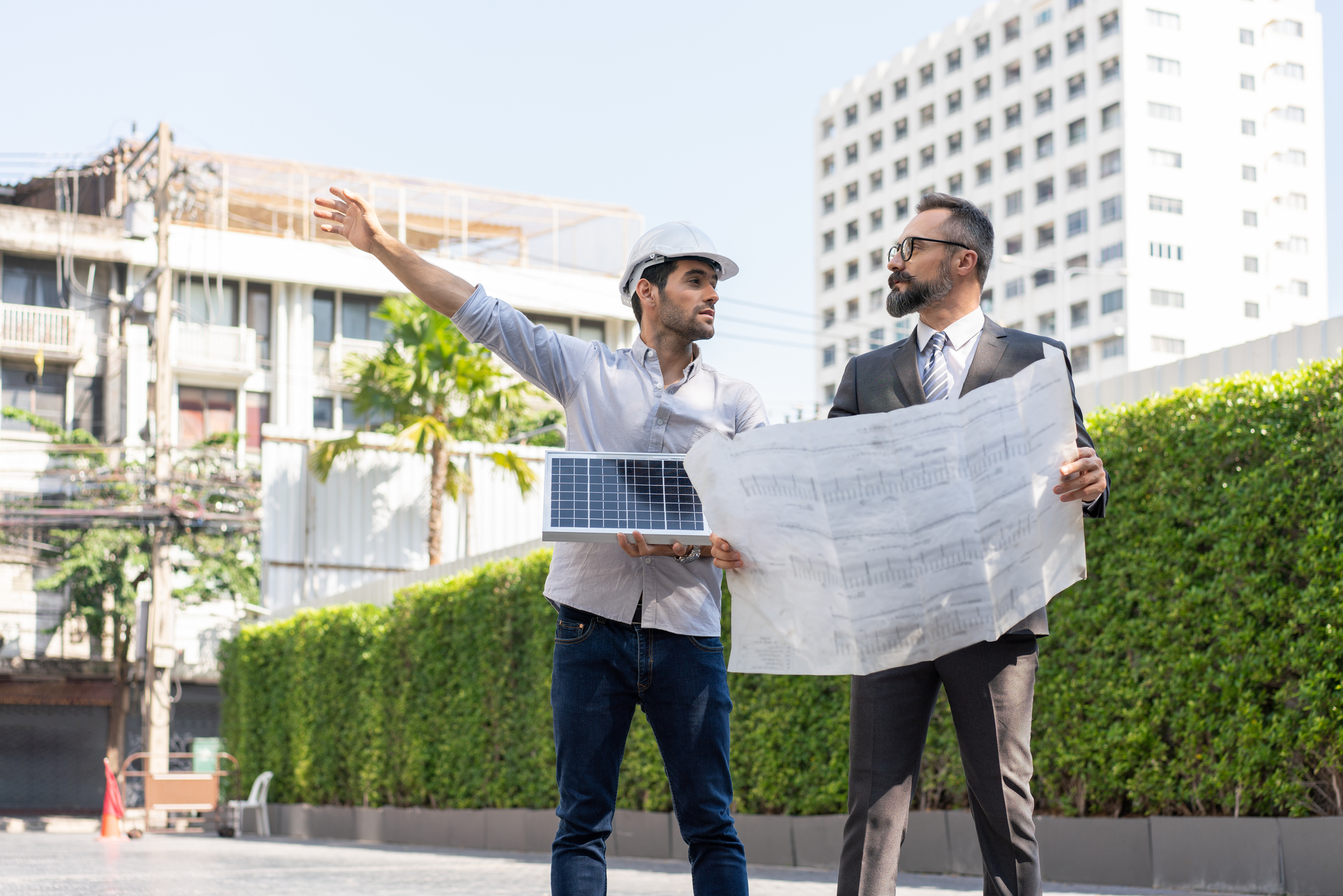 Architect reviewing energy-efficient building plans eligible for 179D deduction