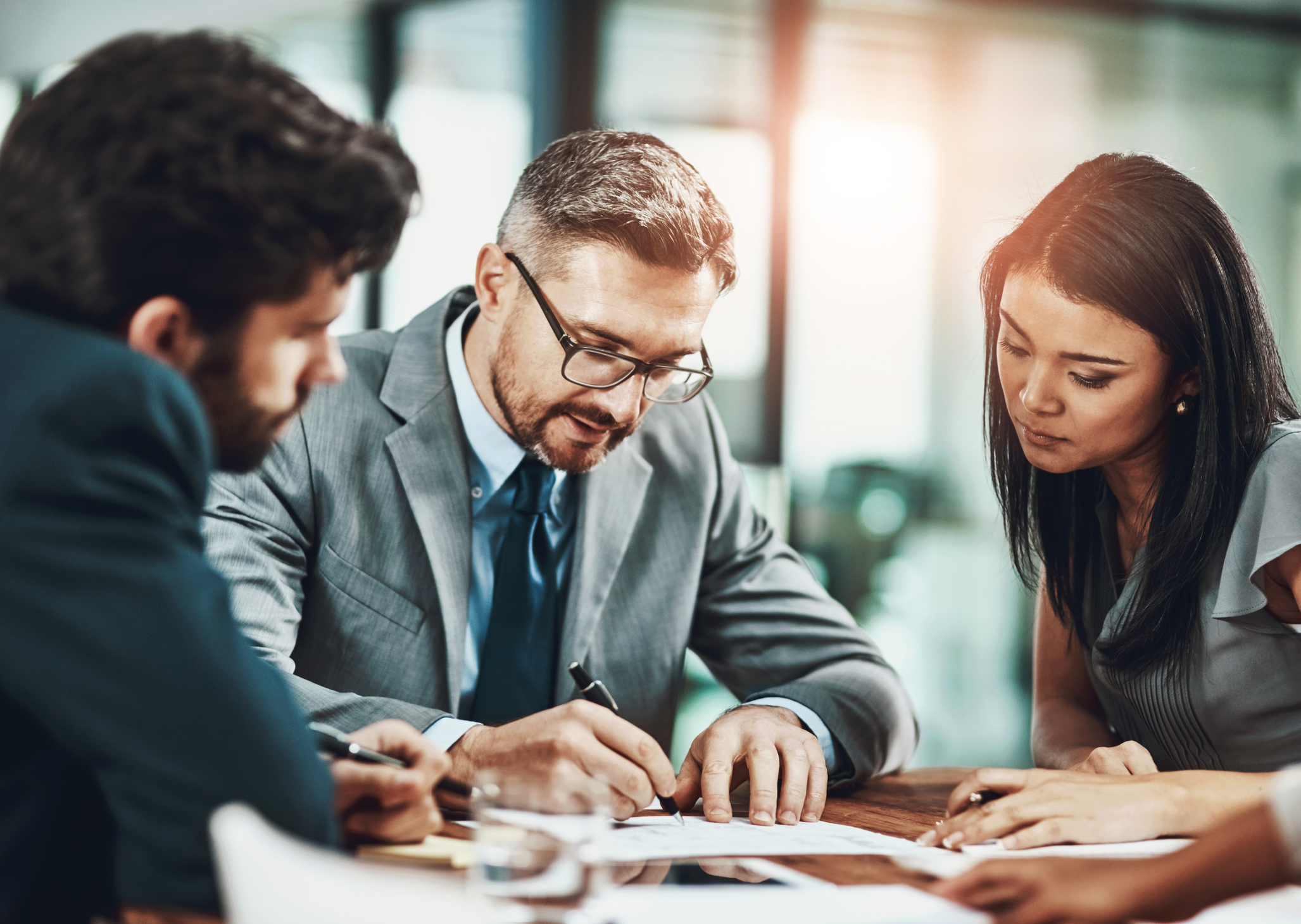 An Archer Lewis tax advisor meeting with a business client