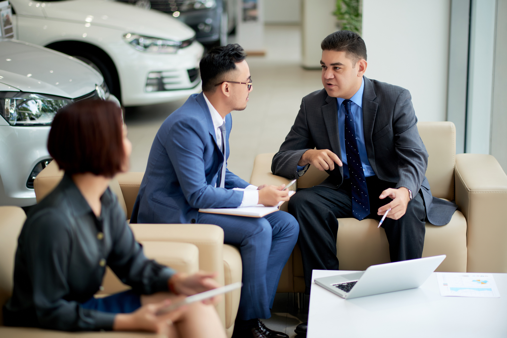 Archer Lewis advisor working with an auto dealership owner on financial planning and tax strategy